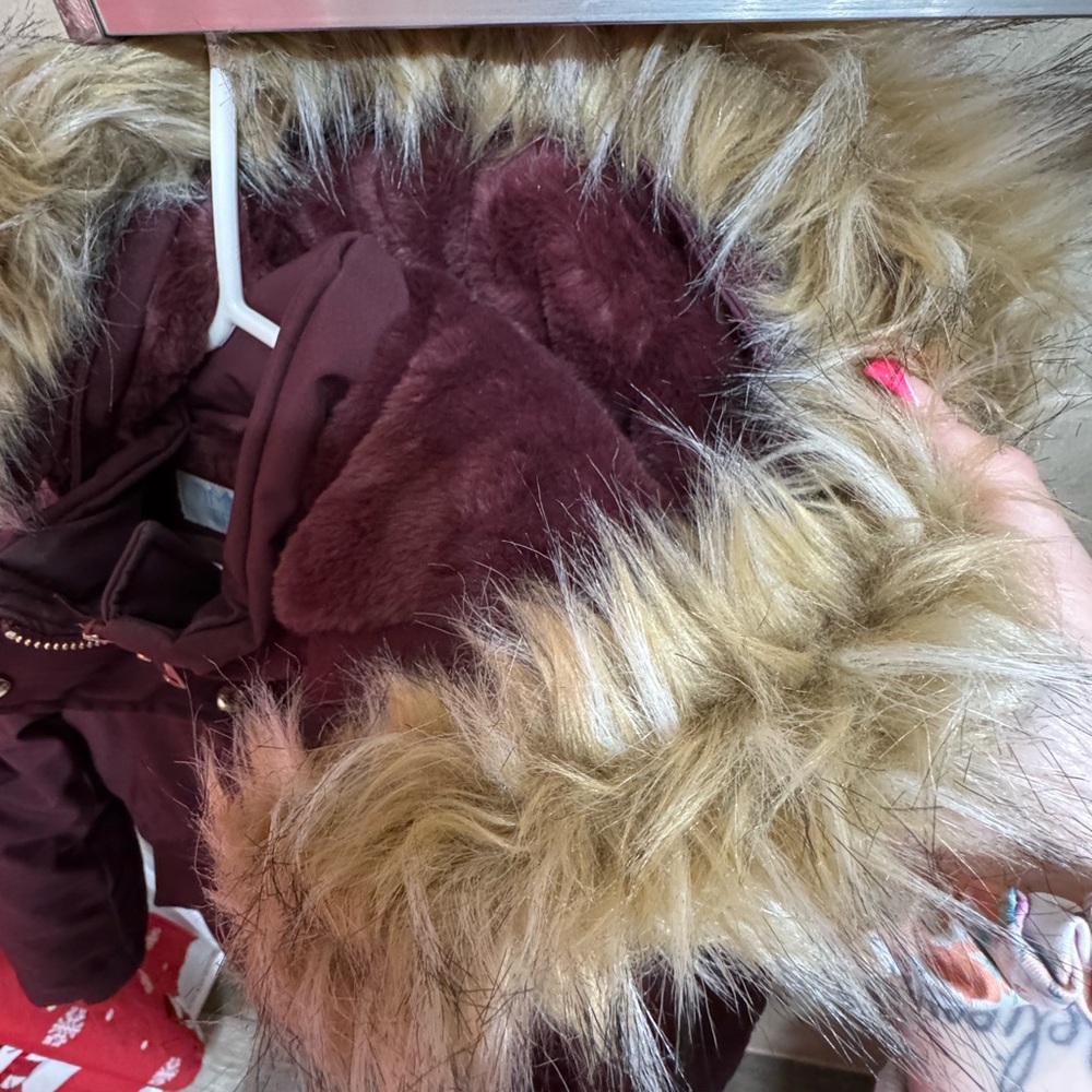 Snow coat
Fur hood 
Size Small 
Extremely warm